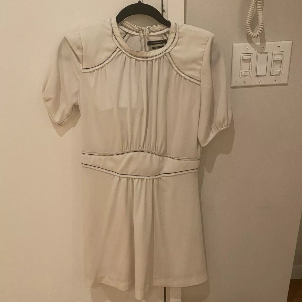 Isabel Marant cream dress with black stitching.